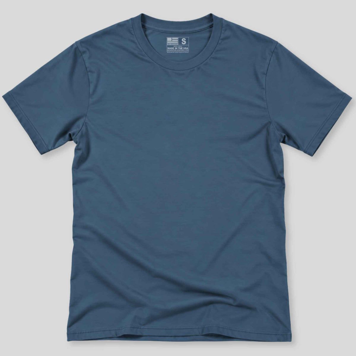 A slate blue crewneck short-sleeve t-shirt laid flat against a neutral gray background.