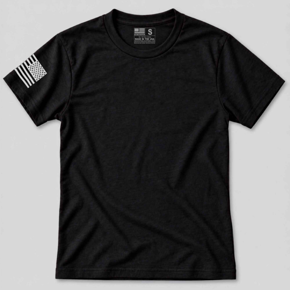 A black short-sleeve crewneck t-shirt with a distressed black-and-white American flag graphic on the left sleeve, displayed flat against a light gray background.
