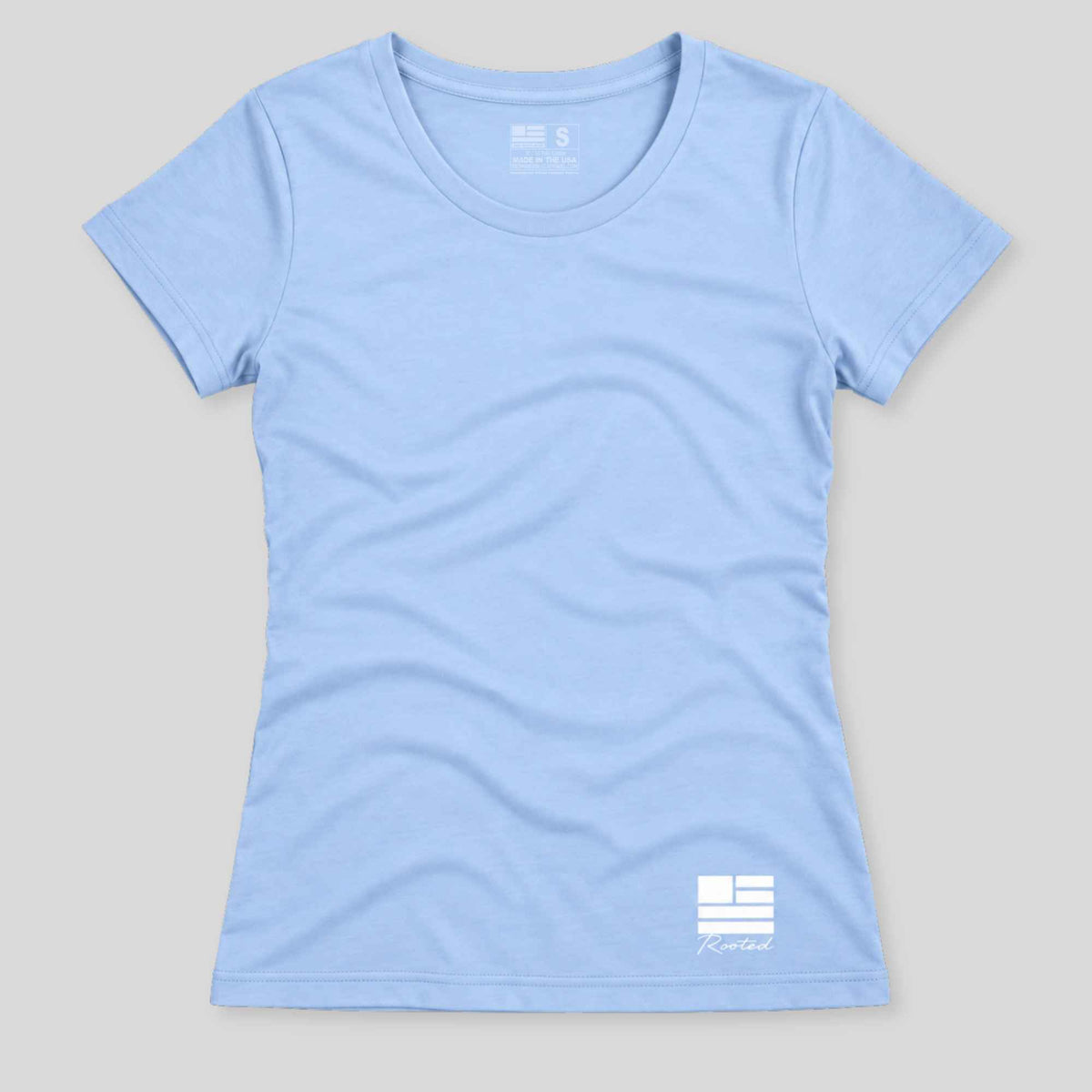 A light blue short-sleeve crewneck t-shirt with a white logo printed near the bottom right hem, displayed flat against a neutral light gray background.